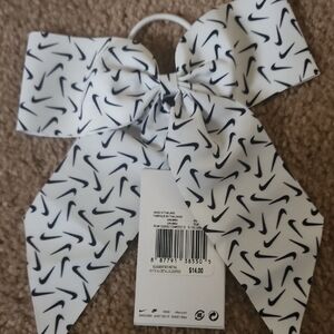 Nike Kids' White Bow with Black Swoosh Pattern